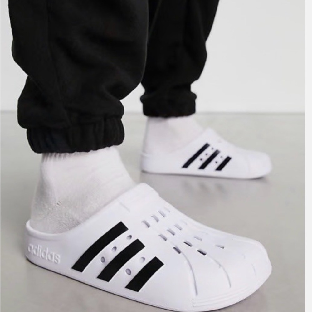 Adidas Adilette Clogs 
Brand new in box with tags 
Women’s size 9
Men’s size 8